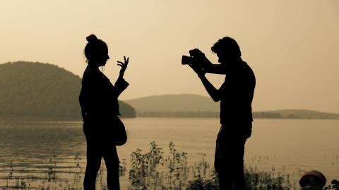 Silhouette of a tourist couple at Chandil Dam